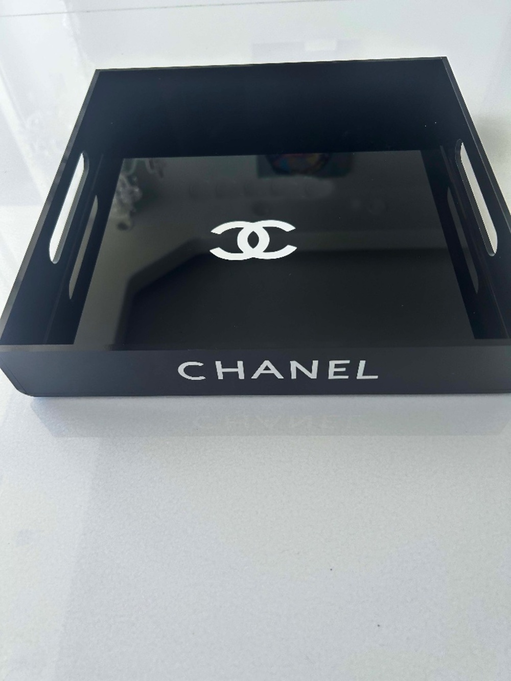 Black acrylic 12x12x2" tray with white lettering